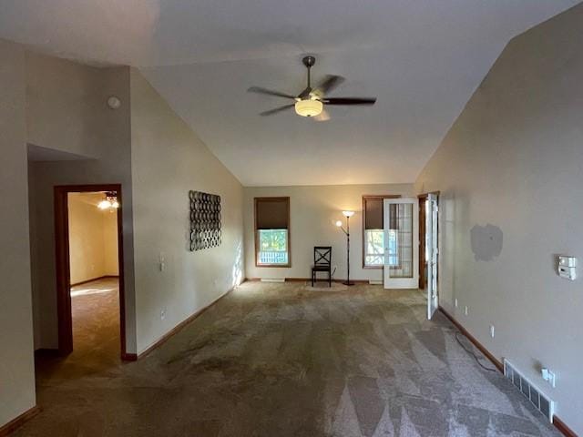 unfurnished living room with carpet, ceiling fan, and lofted ceiling