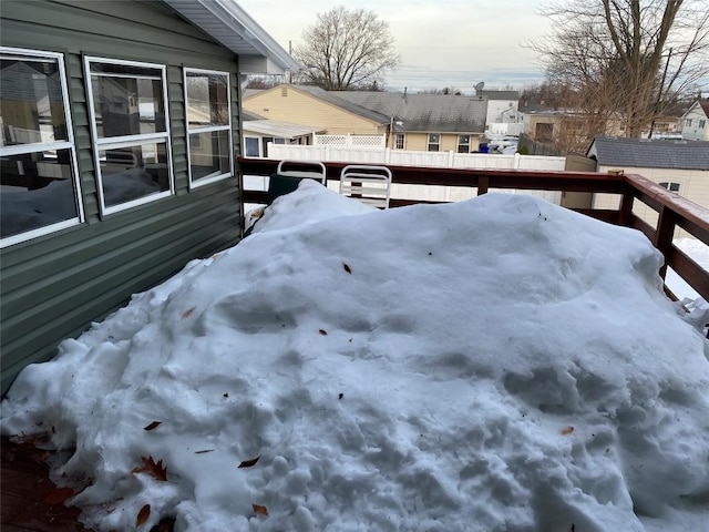 view of snow covered deck