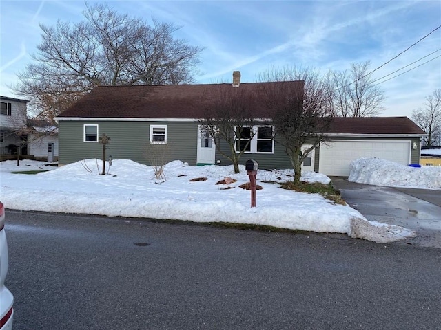 single story home with a garage