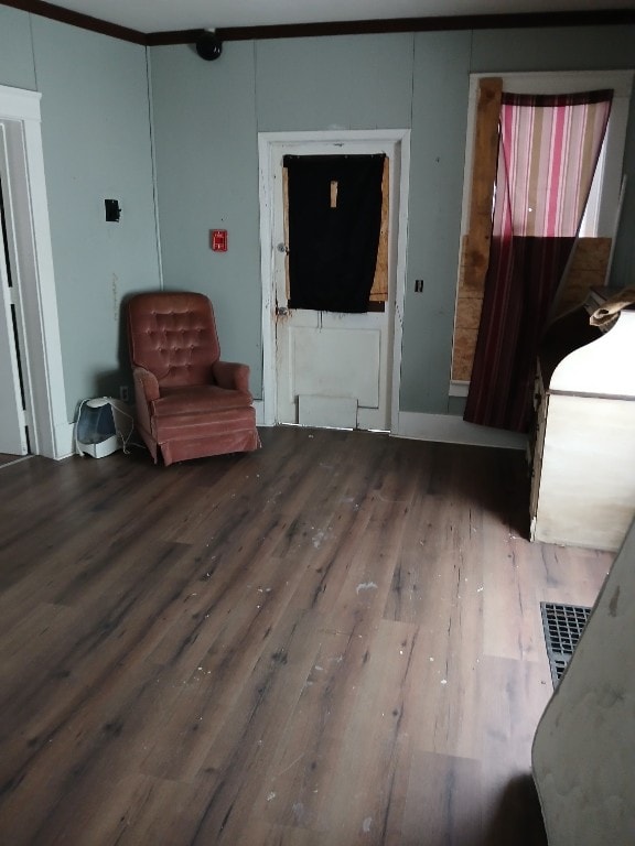 sitting room featuring wood-type flooring