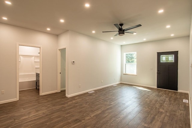 interior space featuring ceiling fan and dark wood-type flooring