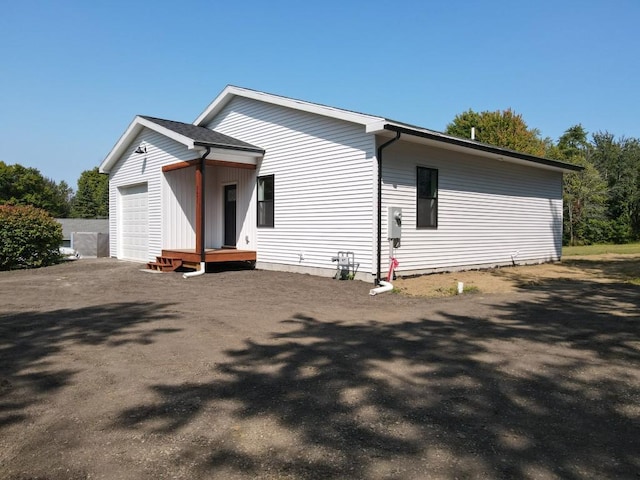 exterior space with a garage