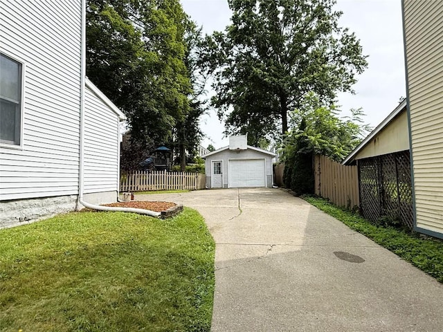 566 Walnut St, Meadville, PA 16335 - view of yard featuring an outbuilding, driveway, and a garage