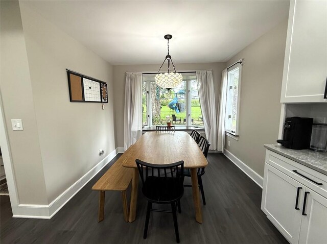 566 Walnut St, Meadville, PA 16335 - dining area with baseboards and dark wood-type flooring