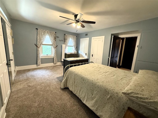 566 Walnut St, Meadville, PA 16335 - carpeted bedroom with two closets and ceiling fan