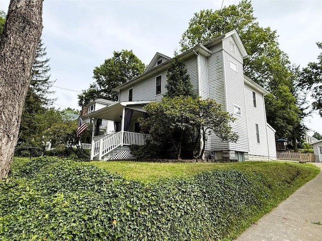 566 Walnut St, Meadville, PA 16335 - view of side of property with covered porch