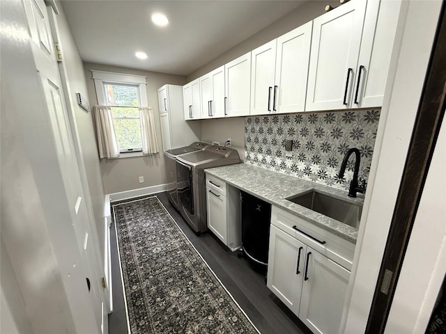 566 Walnut St, Meadville, PA 16335 - laundry area featuring cabinet space, washer and dryer, recessed lighting, and dark wood finished floors