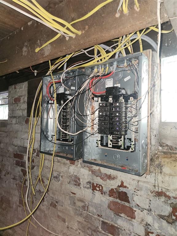 utility room featuring electric panel