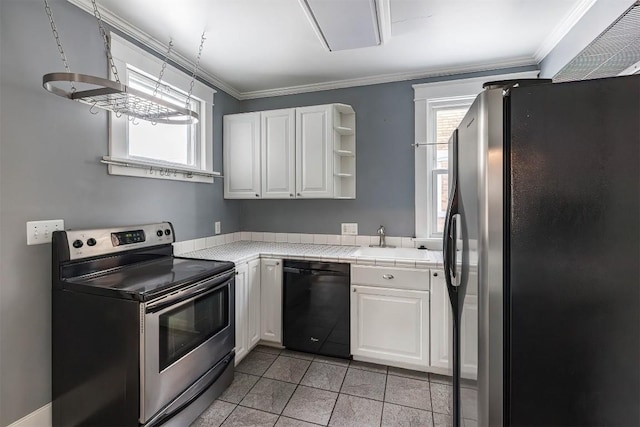 kitchen featuring stainless steel appliances, ornamental molding, and white cabinets