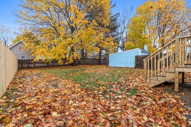 view of yard featuring a wooden deck