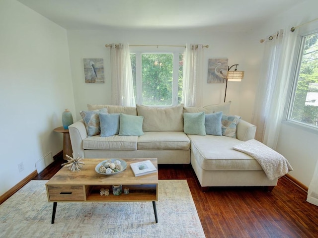 6620 W Ridge Rd, Fairview, PA 16415 - living room featuring dark wood-type flooring and baseboards