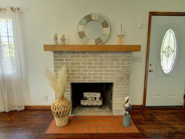 6620 W Ridge Rd, Fairview, PA 16415 - entryway featuring wood finished floors, plenty of natural light, baseboards, and a fireplace
