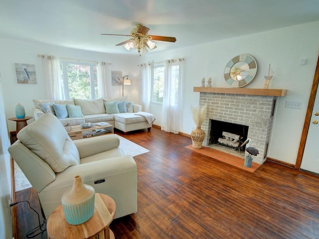 6620 W Ridge Rd, Fairview, PA 16415 - living area featuring ceiling fan, healthy amount of natural light, a brick fireplace, and wood finished floors
