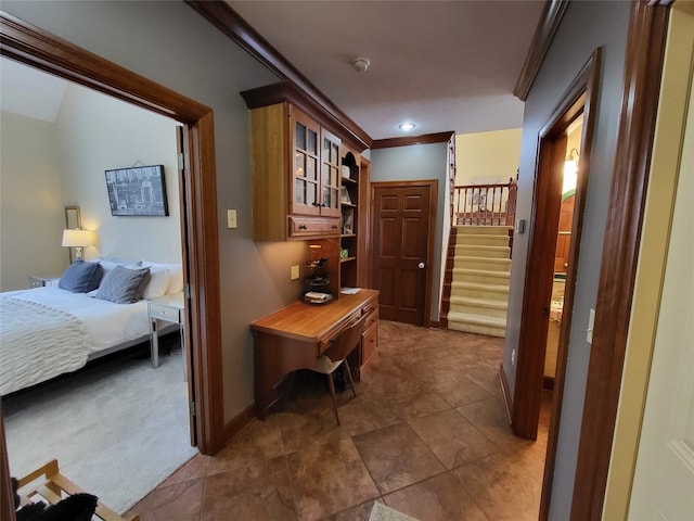 hallway featuring stairway, recessed lighting, baseboards, and ornamental molding