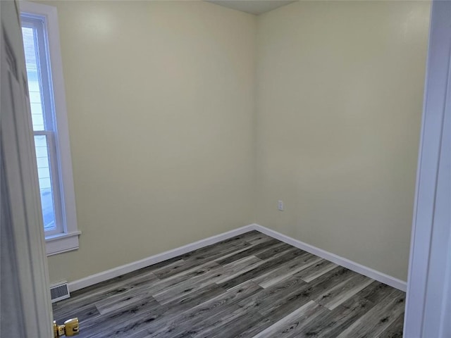 922 E 9th St, Erie, PA 16503 - unfurnished room featuring dark wood-type flooring and plenty of natural light