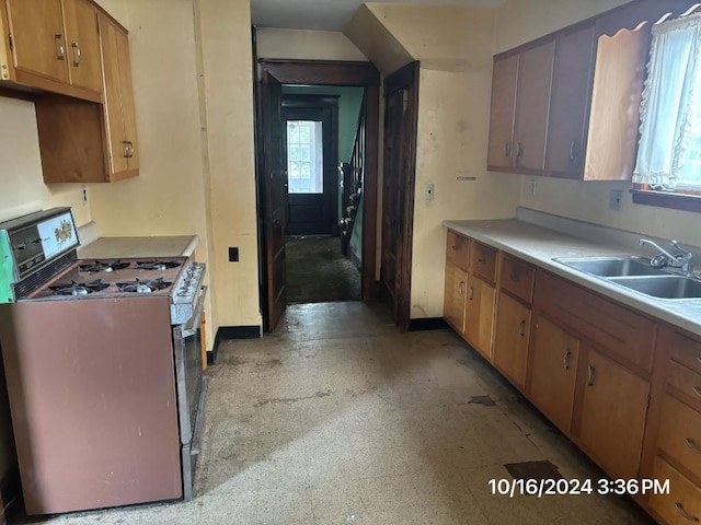 kitchen featuring sink and stainless steel gas range