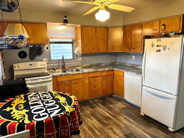 1426 W 45th St, Erie, PA 16509 - kitchen with white appliances, a sink, dark wood-style floors, and brown cabinetry