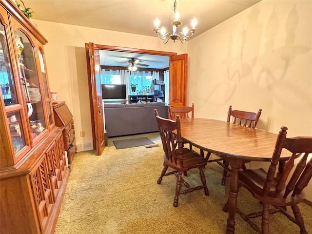 1426 W 45th St, Erie, PA 16509 - dining room with a chandelier and light colored carpet