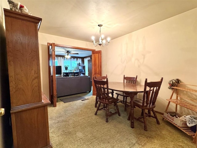 1426 W 45th St, Erie, PA 16509 - carpeted dining space with a chandelier and ceiling fan