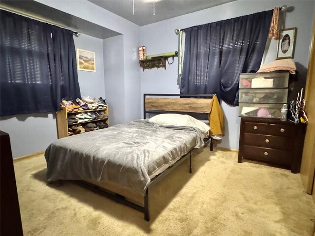 1426 W 45th St, Erie, PA 16509 - carpeted bedroom featuring baseboards