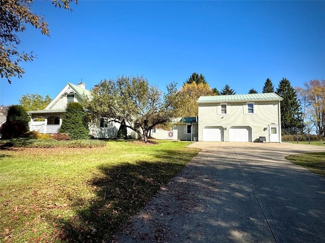 view of front facade featuring central AC unit, a garage, and a front lawn