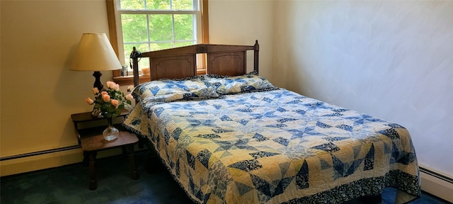 9990 Findley Lake Rd, North East, PA 16428 - carpeted bedroom featuring a baseboard heating unit
