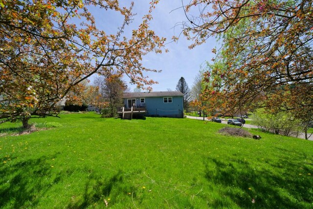 view of yard featuring a deck
