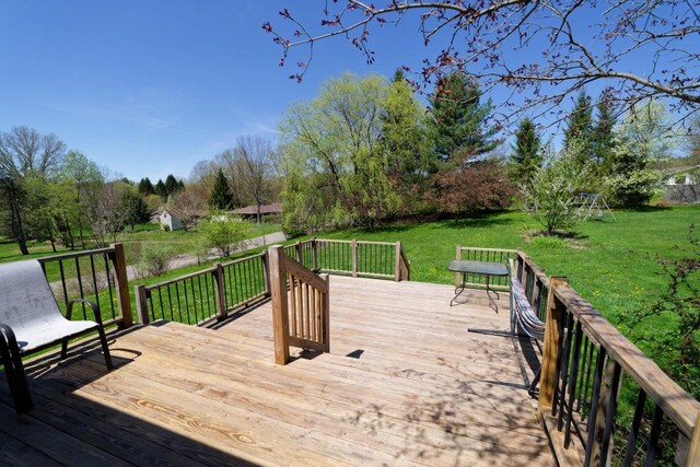 wooden deck with a yard
