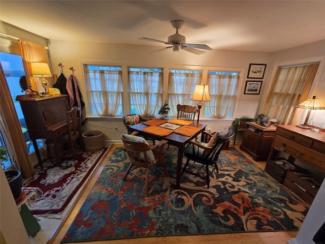 dining area with plenty of natural light and ceiling fan