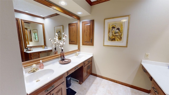 bathroom with tile patterned flooring, vanity, and ornamental molding