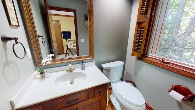 bathroom with vanity and toilet