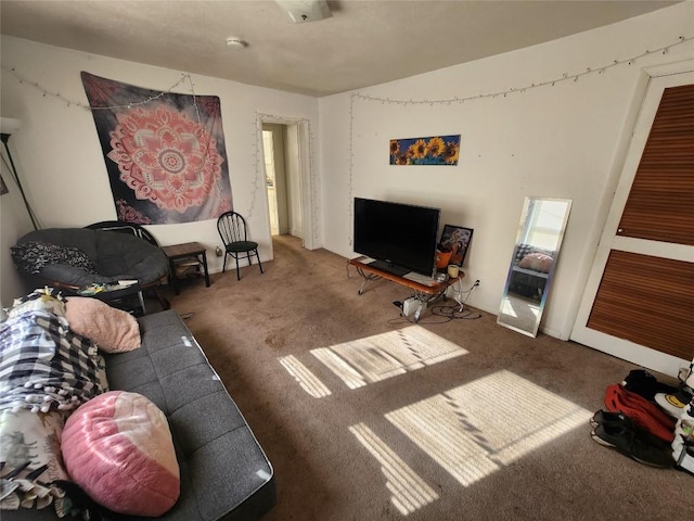 living room featuring dark colored carpet