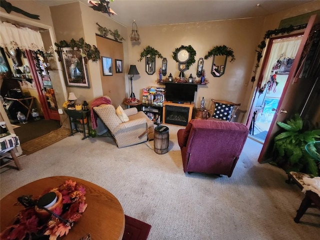 living room with carpet flooring and a wealth of natural light