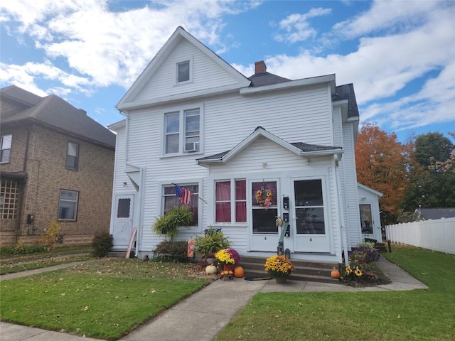 view of front of property with a front yard