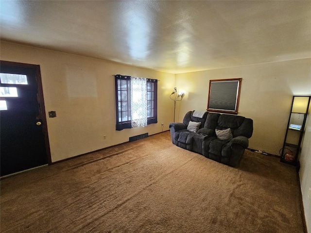 living room featuring carpet floors