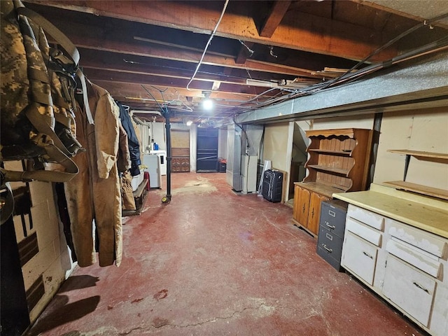 basement with separate washer and dryer