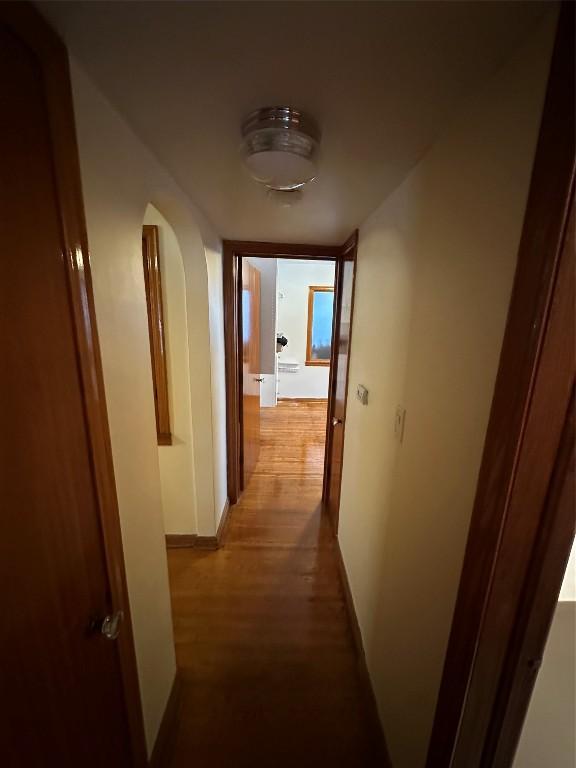 hallway featuring light wood-type flooring