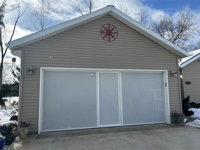 view of snow covered garage