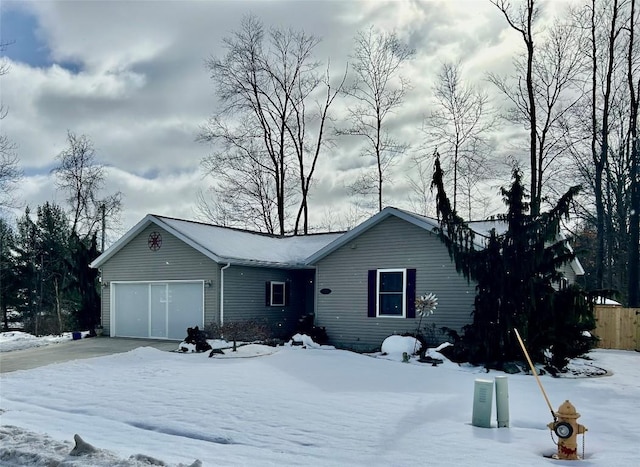 single story home featuring a garage