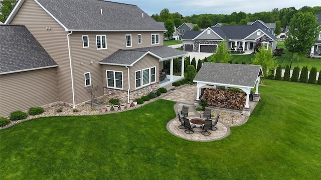5640 Bear Run Cir, Fairview, PA 16415 - rear view of property with a fire pit, an outdoor structure, a lawn, and a patio