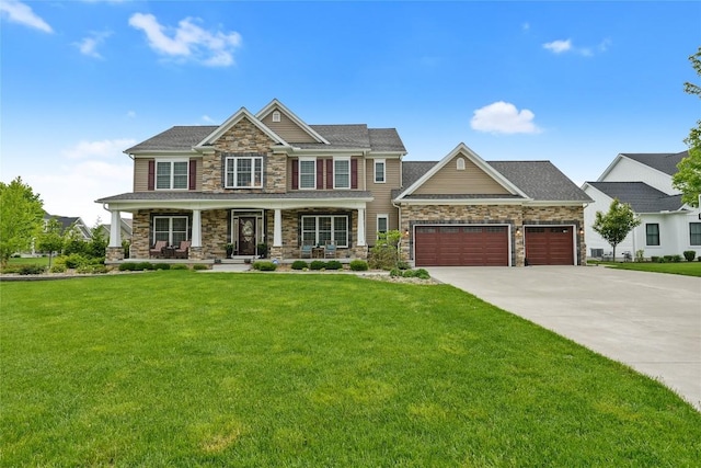 5640 Bear Run Cir, Fairview, PA 16415 - craftsman-style home with stone siding, a garage, a porch, concrete driveway, and a front yard