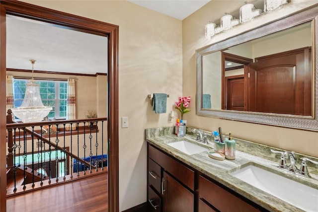 5640 Bear Run Cir, Fairview, PA 16415 - bathroom featuring double vanity, baseboards, and crown molding