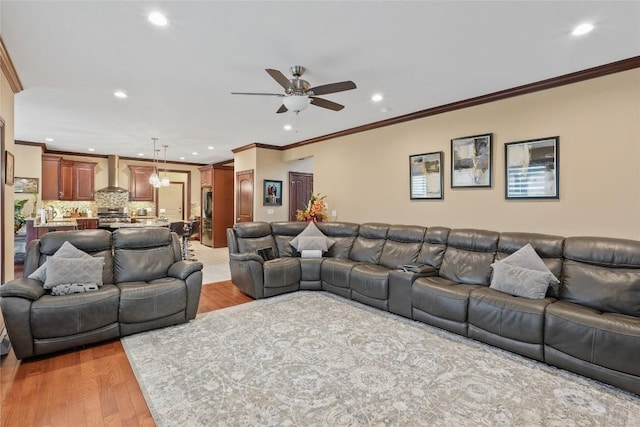 5640 Bear Run Cir, Fairview, PA 16415 - living room featuring ceiling fan, light wood finished floors, recessed lighting, and crown molding