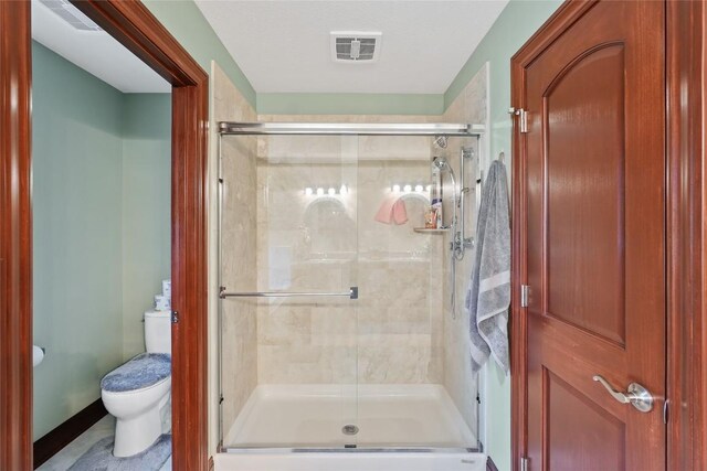 5640 Bear Run Cir, Fairview, PA 16415 - bathroom with toilet and a stall shower