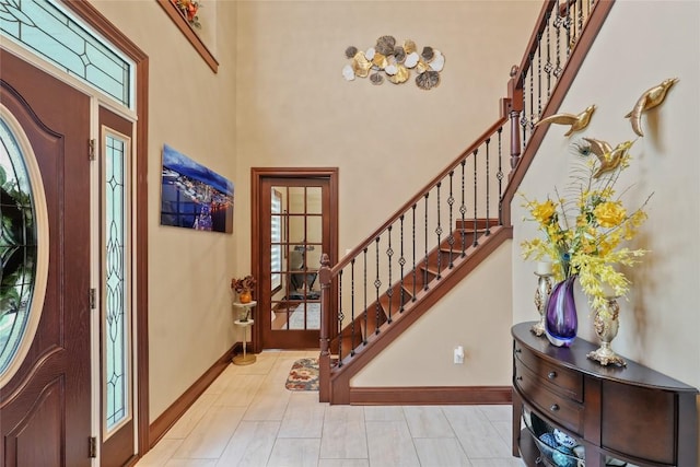5640 Bear Run Cir, Fairview, PA 16415 - entrance foyer with stairway, baseboards, healthy amount of natural light, and a towering ceiling