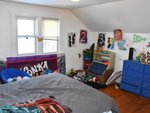 bedroom with dark wood-type flooring and vaulted ceiling