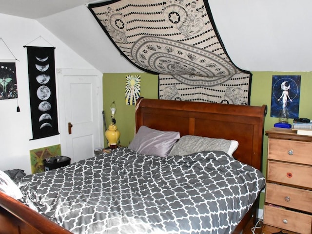 bedroom featuring vaulted ceiling