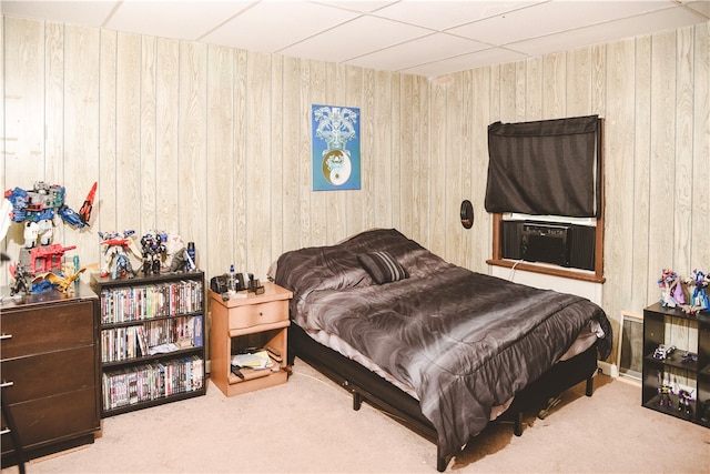 212 Main St, Jamestown, PA 16134 - carpeted bedroom with wooden walls, cooling unit, and a paneled ceiling