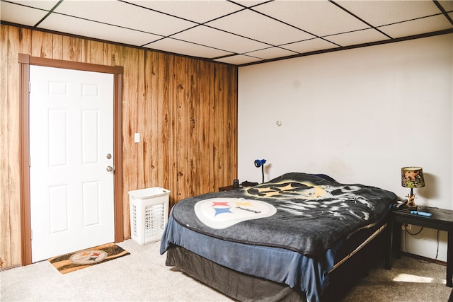 212 Main St, Jamestown, PA 16134 - bedroom with wood walls, carpet, and a paneled ceiling