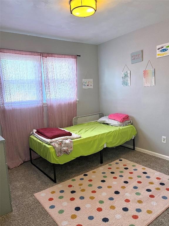 bedroom featuring carpet